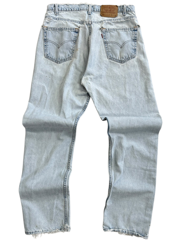 Vintage 90s Levis 505 Distressed Light Wash Blue Denim Jeans