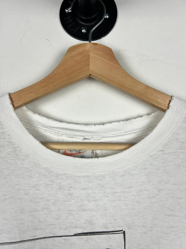 Vintage 90s Nike A Woman Must Act Like A Lady White Tee
